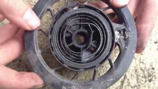 PushMowerRepaircom  Briggs 35HP Recoiling a Starter Spring [upl. by Atoiganap]