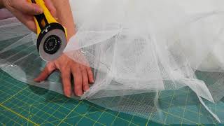 Wedding dress alterations  cutting tulle with rotary cutter [upl. by Vaenfila]