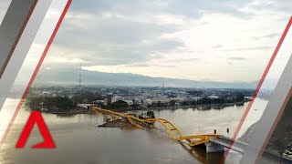 Drone footage of tsunamihit Indonesian city Palu [upl. by Aiyotal]