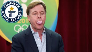 Bob Costas attempts largest bubblegum bubble world record [upl. by Tnilc]