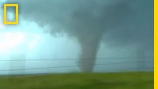 Tornadoes Lightning in Rare Video  National Geographic [upl. by Maddis]