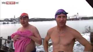 Russian Swim Club Takes Plunge In Arctic Lake [upl. by Horwath]