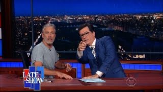 Jon Stewart Takes Over Colberts Late Show Desk [upl. by Nollahs589]